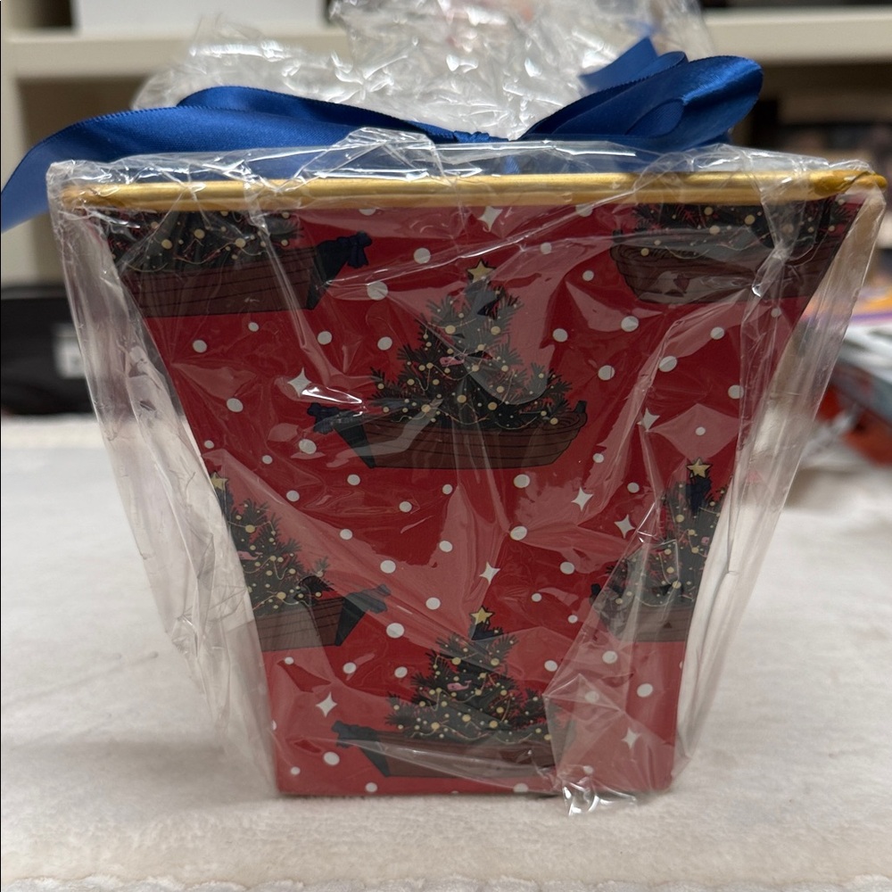 Vineyard Vine Festive Red candle with Christmas tree design. Approx 6” x 6”
